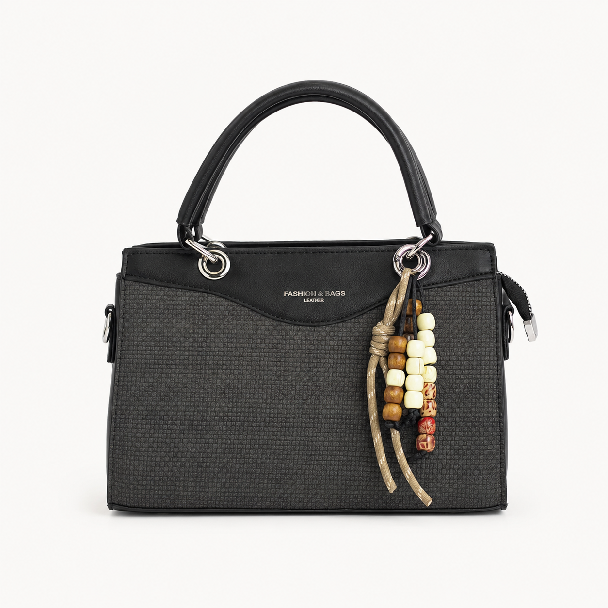 Bolso de mano LUNA negro en tejido corrugado con charm artesanal - CALÉA