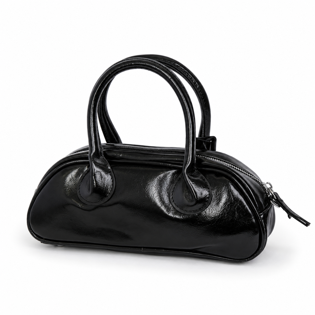 Mini bolso TATIANA negro vista angular con acabado brillante - CALÉA
