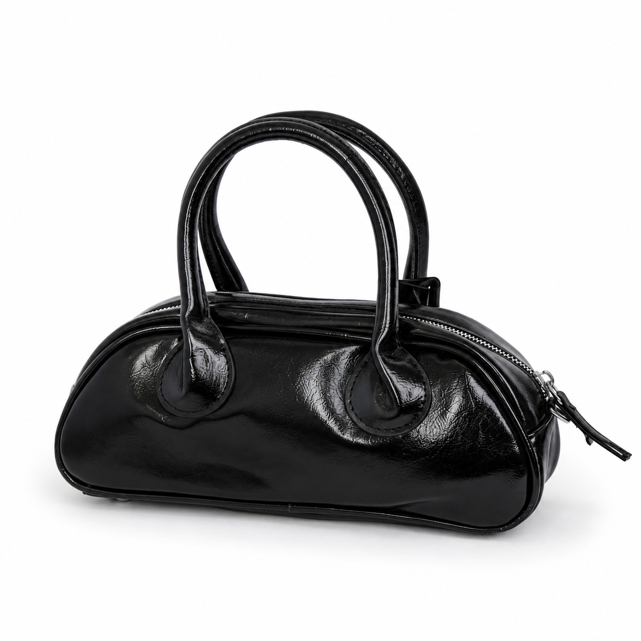 Mini bolso TATIANA negro vista angular con acabado brillante - CALÉA