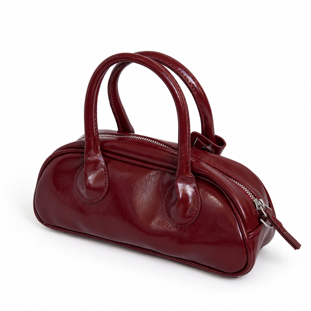 Mini bolso TATIANA rojo vino vista angular con acabado brillante - CALÉA